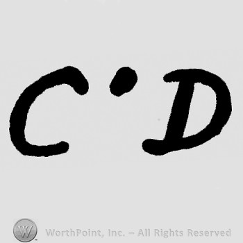 Letters C.D and a dot.