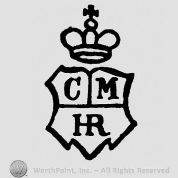 A crown with cross on top of a shield shape with C M HR inside.