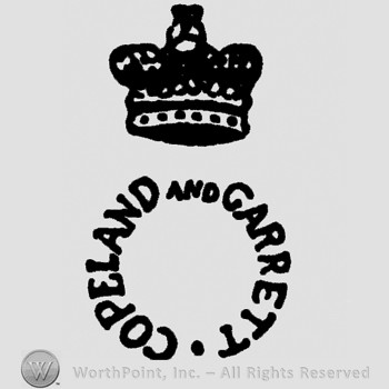 A crown above Copeland and Garrett round written.