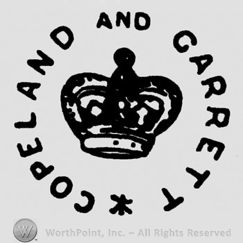 A crown in the middle;Copeland and Garrett written in circle.
