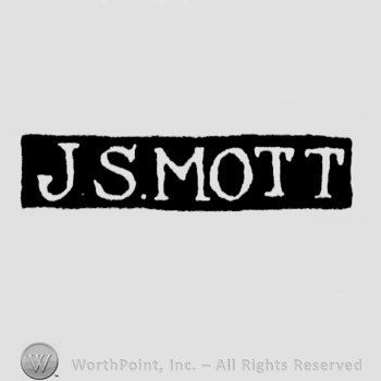 The name J.S. Mott written with uppercase letters
