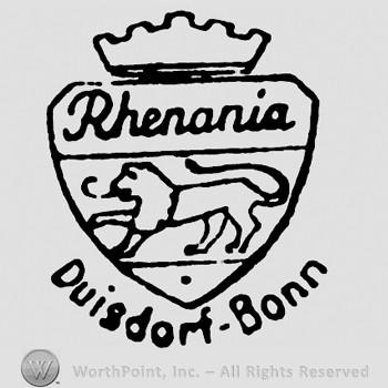 Shield shape with a crown on top;a lion and RHENANIA written inside;DUISDORF BONN written on the bottom.