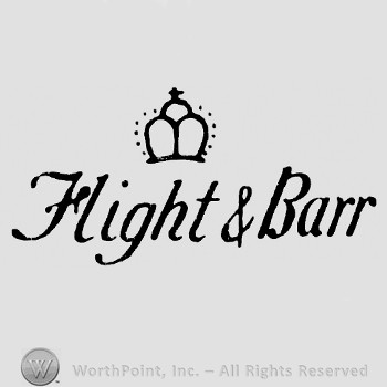 Crown with cross on top of FLIGHT & BARR.