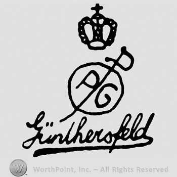 A crown with cross on top;PG inside a circle;word Gunthersfeld written below.