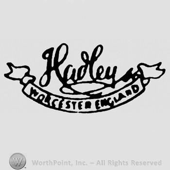 Hadley written on top of a ribbon with words Worcester England inside.
