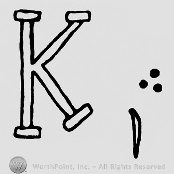 Letter K , a line and three dots.
