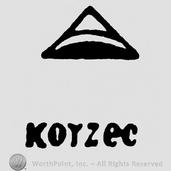 A triangle with word Korzec written below.