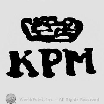 A crown and letters KPM below.