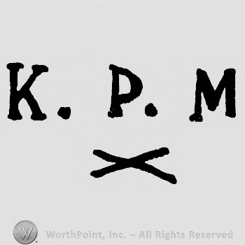 KPM on top;X below.