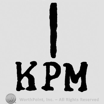 Letters KPM and a vertical line on top.