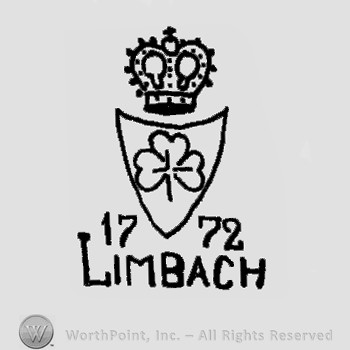 A crown wth a shield below;a flower inside;1772 Limbach written below.