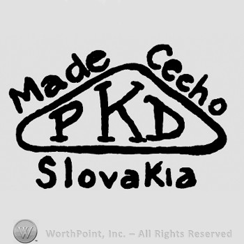 Triangle with PKD inside;Made Cecho Slovakia written outside.