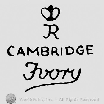 Letter R and a crown on top;Cambridge Ivory written below.