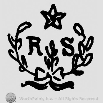 Shape made from branches with a star on top;letters R S inside.