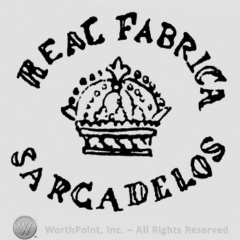 Crown in the middle;Real Fabrica on top;Sargadelos written below.