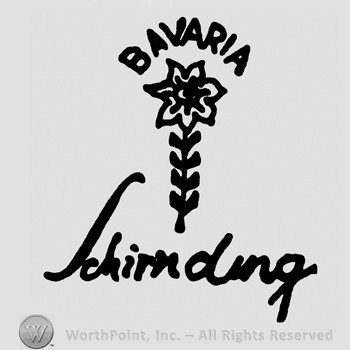 Bavaria written on top;A flower in the center;Schirnding at the bottom.