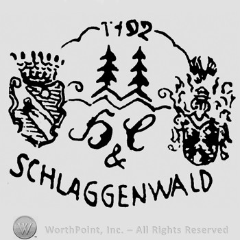 H&C and two trees in the middle;a shield with crown on the left side;number 1792 on top;word Schlaggenwald written below.