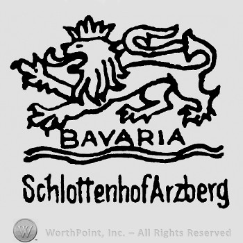 Lion with crown on top;word Bavaria in the center;Schlottenhof Arzberg written on the bottom.