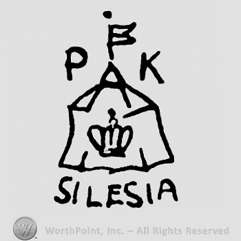Crown in the middle;PK and a flag on top;Silesia written below.