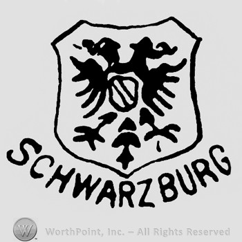 Eagle inside a shield shape;Schwarzburg written below.
