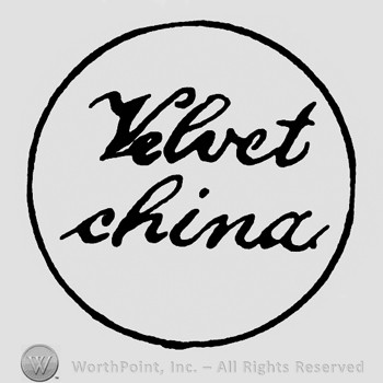 Velvet China inside a circle.