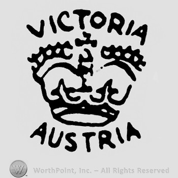 A crown with cross and word Victoria on top;Austria written below.