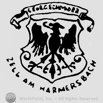 Shape similar with an eagle in the middle;Zell Am Hammersbach written below.