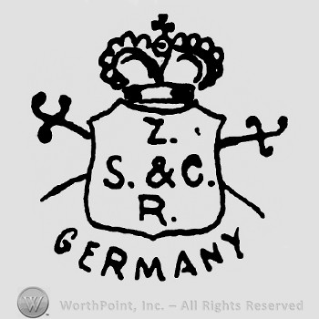 Shield with crown and cross on top;Word Germany below and two crossed swords.