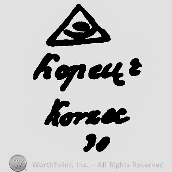 Triangle with word Kopeuz Korzec written below.