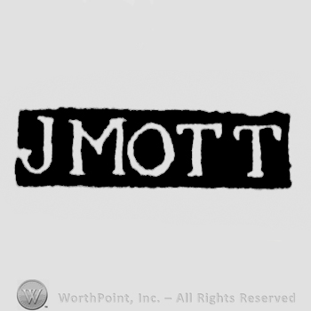The name J Mott written with uppercase letters