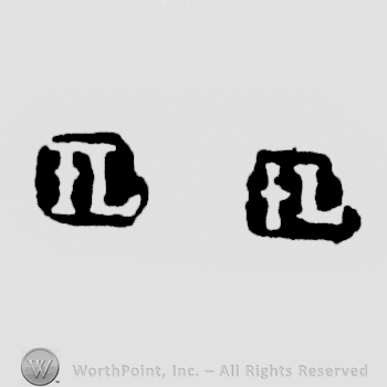 The letters IL written in uppercase