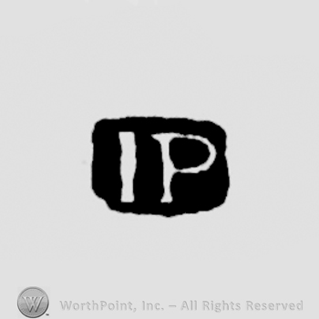 The letters JP written in uppercase