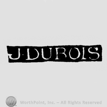 The name J. Dubois written with uppercase letters