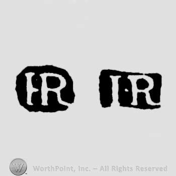 The letters IR written in uppercase