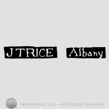 The name J T Rice written with uppercase letters next to 'Albany' written with lowercase letters