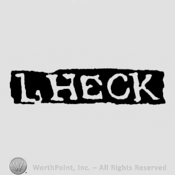 The name L. Heck written with uppercase letters
