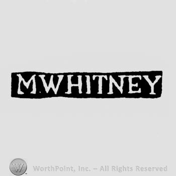 The name M. Whitney written with uppercase letters