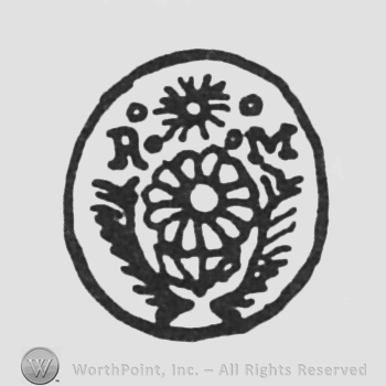 capital letters RM up star between flower between leaf under all inside a circle