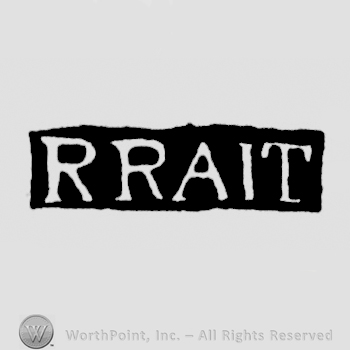 The name R Rait written with uppercase letters