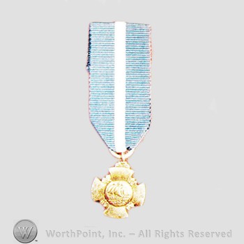 Military decoration : Navy Cross.