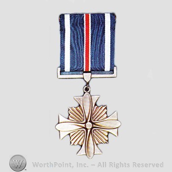 Military decoration : Distinguished Flying Cross.