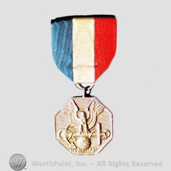 Military decoration : Navy and Marine Corps Medal.