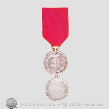 Military decoration : Navy Good Conduct Medal.