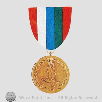 Military decoration : NC-4 Medal.