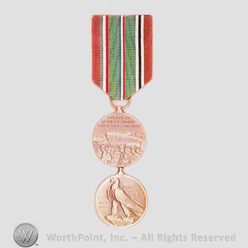 Military decoration : European-African-Middle Eastern Campaign Medal.