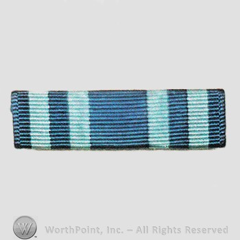 Military decoration : Air Force Longevity Service Award.