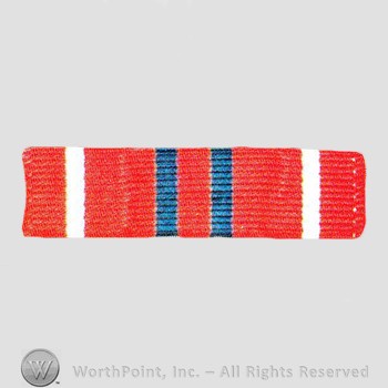 Military decoration : Air Force Noncommissioned Officer Academy Gratuate Ribbon.
