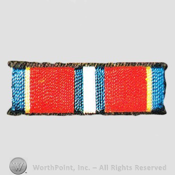 Military decoration : Coast Guard Service Meritorious Service Ribbon.