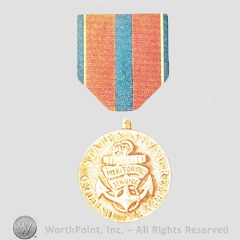 Military decoration : Navy Reserve Meritorious Service Medal.
