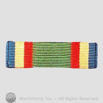 Military decoration : Navy Meritorious Unit Commendation.